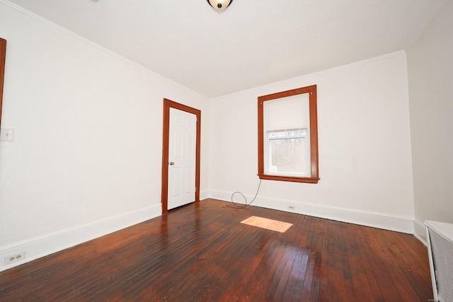 639 Cooke St, Waterbury, CT 06710 - spare room featuring dark wood-style flooring, baseboards, and ornamental molding