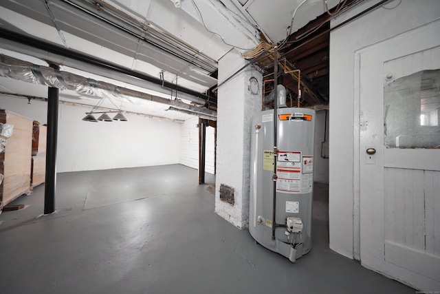 639 Cooke St, Waterbury, CT 06710 - unfinished below grade area with gas water heater
