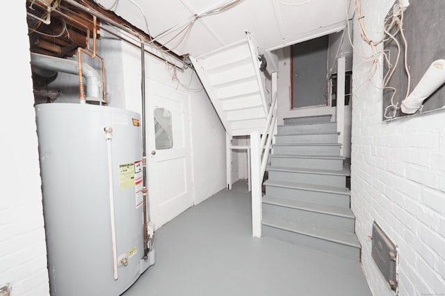 639 Cooke St, Waterbury, CT 06710 - unfinished basement featuring stairway and water heater