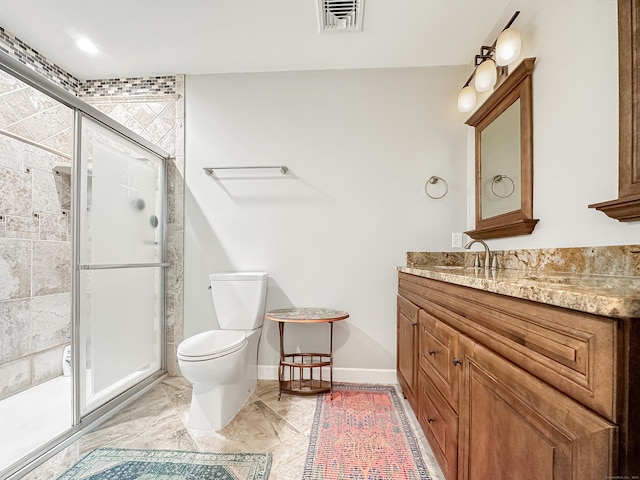 bathroom featuring a shower stall, vanity, marble finish floor, toilet, and visible vents