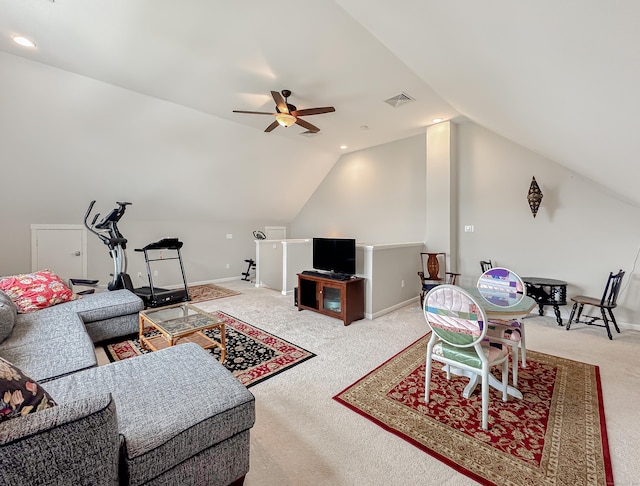 carpeted living area featuring ceiling fan, lofted ceiling, visible vents, and baseboards