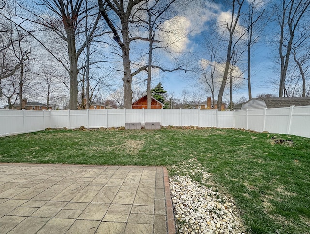 view of yard with a patio and fence