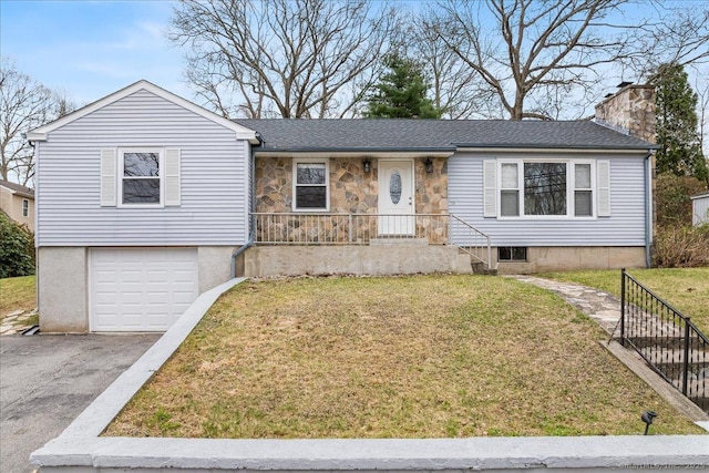 134 Gallivan Ln, Montville, CT 06382 - ranch-style home featuring a chimney, a front lawn, driveway, and a garage