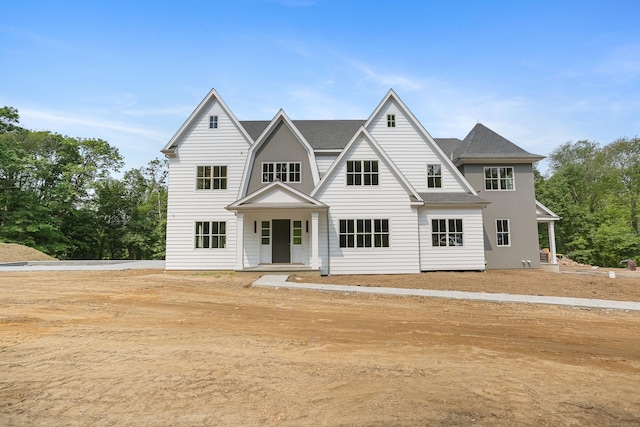 11 Tierney Ln, Westport, CT 06880 - view of front facade featuring a shingled roof