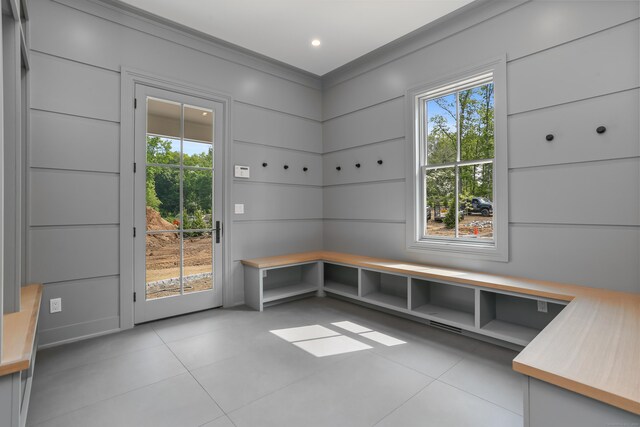 11 Tierney Ln, Westport, CT 06880 - mudroom with tile patterned floors and ornamental molding
