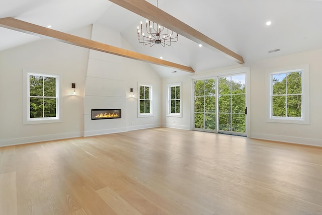 11 Tierney Ln, Westport, CT 06880 - unfurnished living room featuring a chandelier, beam ceiling, baseboards, recessed lighting, and plenty of natural light