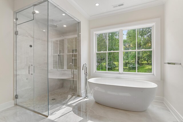 11 Tierney Ln, Westport, CT 06880 - bathroom featuring marble tiled flooring, healthy amount of natural light, a freestanding bath, and recessed lighting