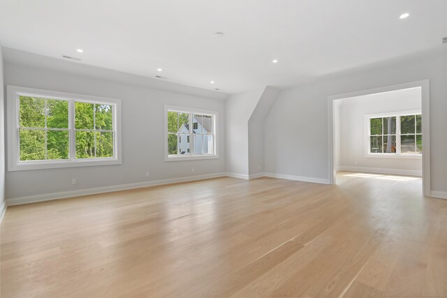 11 Tierney Ln, Westport, CT 06880 - unfurnished living room with light wood-type flooring, baseboards, and recessed lighting