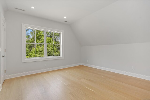 11 Tierney Ln, Westport, CT 06880 - additional living space featuring lofted ceiling, baseboards, light wood-style flooring, and recessed lighting