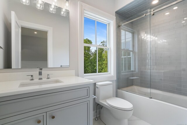 11 Tierney Ln, Westport, CT 06880 - bathroom featuring vanity, enclosed tub / shower combo, and toilet