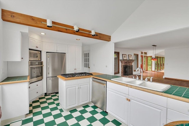 89 E St, Morris, CT 06763 - kitchen with stainless steel appliances, a sink, light floors, white cabinetry, and recessed lighting