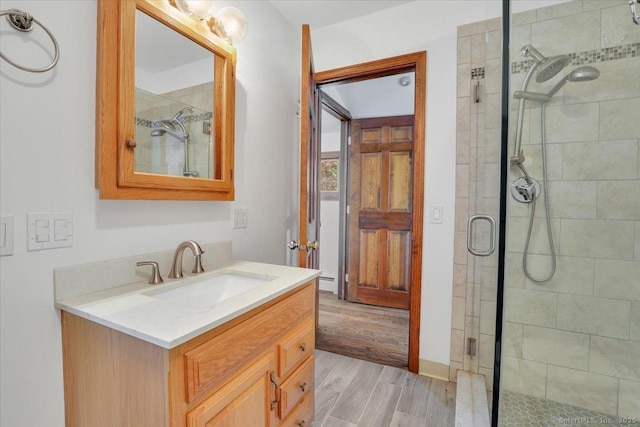 89 E St, Morris, CT 06763 - bathroom with a stall shower, wood finished floors, and vanity