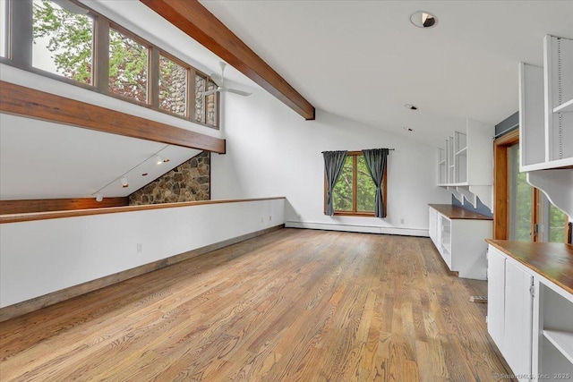 89 E St, Morris, CT 06763 - unfurnished living room with wood finished floors, track lighting, ceiling fan, baseboard heating, and baseboards