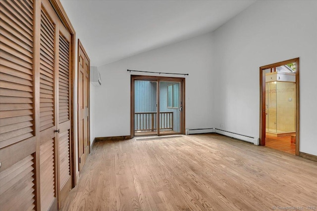 89 E St, Morris, CT 06763 - unfurnished bedroom featuring lofted ceiling, light wood-type flooring, baseboard heating, access to exterior, and baseboards