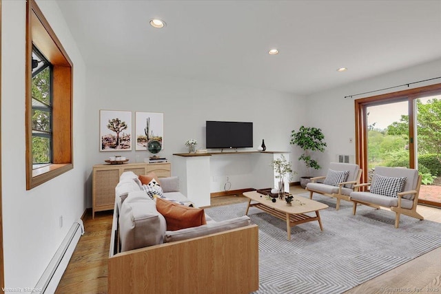 89 E St, Morris, CT 06763 - living room featuring a baseboard radiator, recessed lighting, and wood finished floors