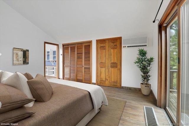 89 E St, Morris, CT 06763 - bedroom featuring a wall unit AC, light wood-type flooring, lofted ceiling, and baseboards