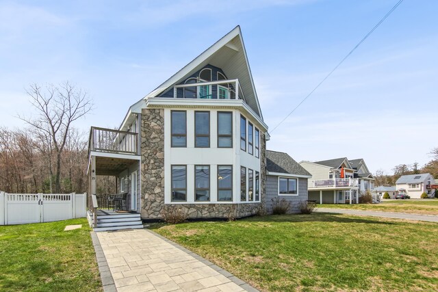 75 N Main St, East Hampton, CT 06424 - view of front of home with a balcony and stone siding