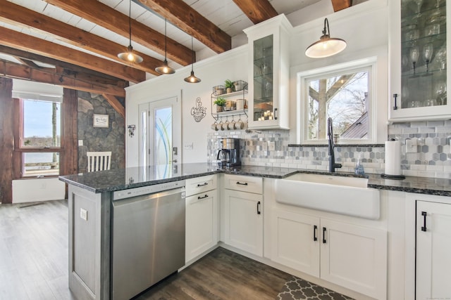 75 N Main St, East Hampton, CT 06424 - kitchen featuring stainless steel dishwasher, tasteful backsplash, a peninsula, dark wood finished floors, and decorative light fixtures