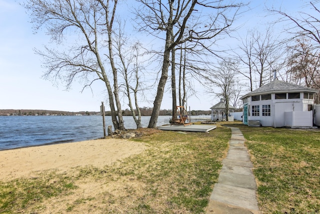 75 N Main St, East Hampton, CT 06424 - view of grassy yard with a deck with water view
