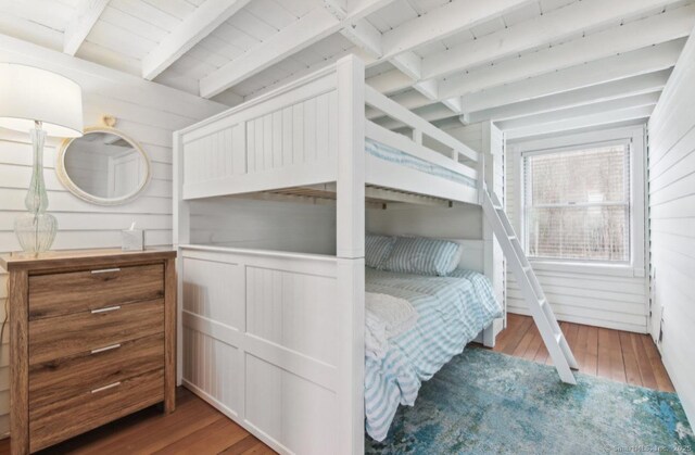 75 N Main St, East Hampton, CT 06424 - bedroom featuring wood-type flooring, wood walls, and a wood ceiling with exposed beams