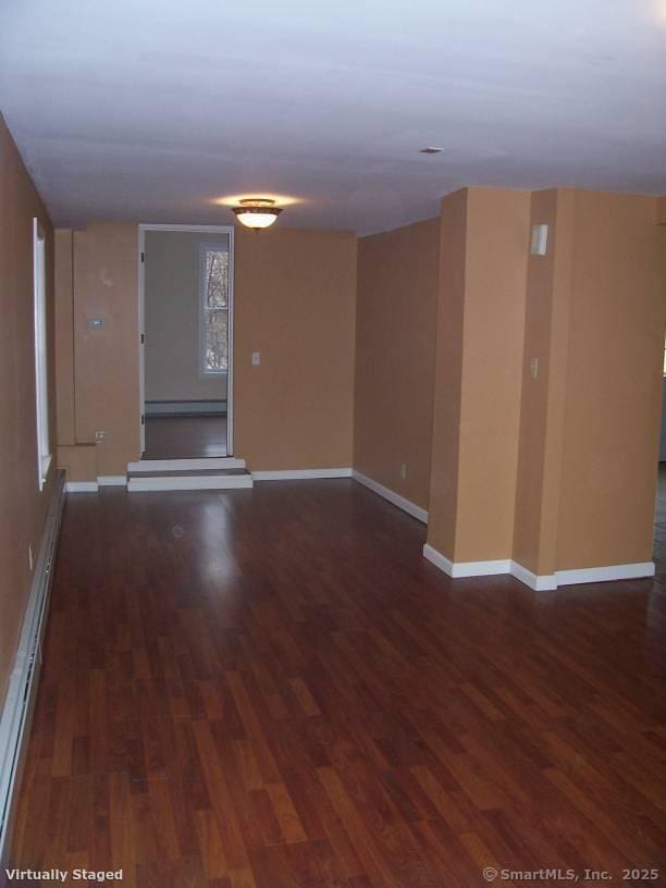 14 Court St, West Haven, CT 06516 - spare room featuring baseboards, a baseboard heating unit, and wood finished floors