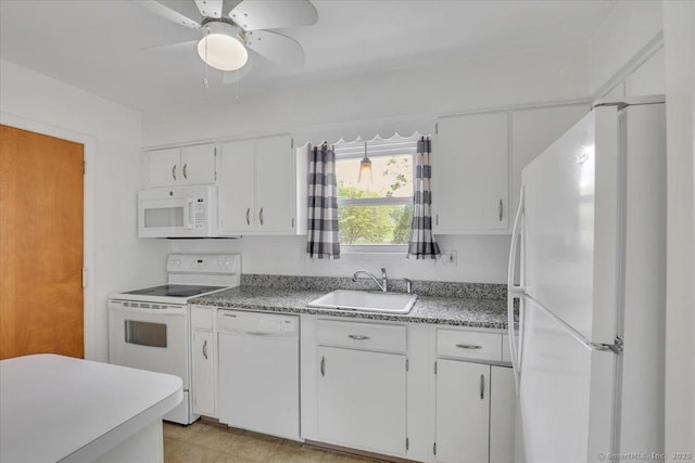 kitchen with white appliances, a sink, white cabinets, a ceiling fan, and light countertops