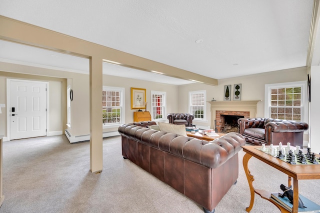 living area featuring plenty of natural light, baseboards, light carpet, and a fireplace