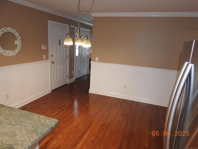 70 Allison Way Unit 70, East Haven, CT 06512 - unfurnished dining area with a wainscoted wall, a chandelier, wood finished floors, crown molding, and baseboards