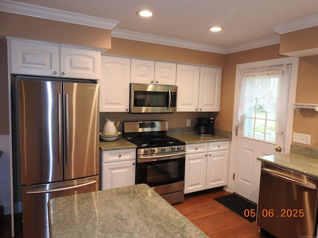 70 Allison Way Unit 70, East Haven, CT 06512 - kitchen with appliances with stainless steel finishes, dark wood-style floors, white cabinetry, crown molding, and recessed lighting