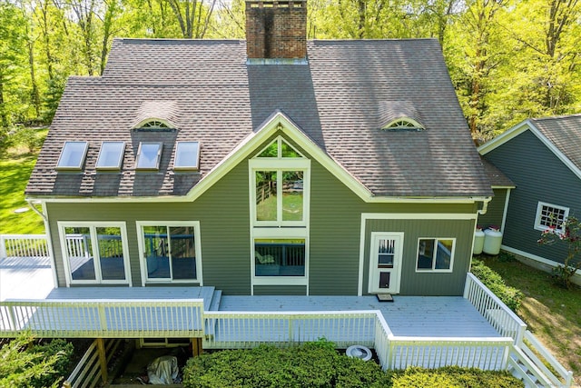 128 Spaulding Rd, Brooklyn, CT 06234 - back of house with a wooden deck, a chimney, and roof with shingles