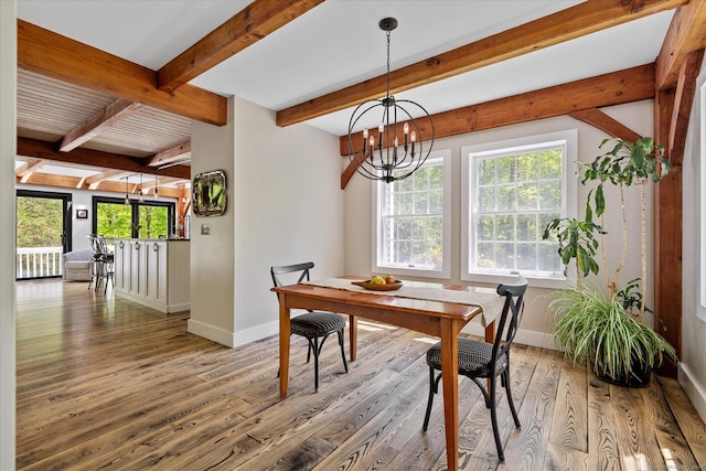 128 Spaulding Rd, Brooklyn, CT 06234 - dining room with baseboards, wood-type flooring, a chandelier, and beam ceiling