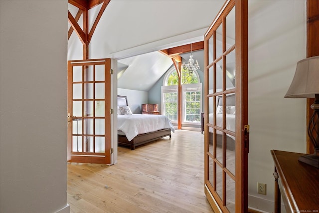 128 Spaulding Rd, Brooklyn, CT 06234 - bedroom with vaulted ceiling, wood-type flooring, and a chandelier