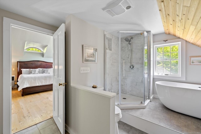 128 Spaulding Rd, Brooklyn, CT 06234 - full bathroom featuring a shower stall, a soaking tub, tile patterned flooring, vaulted ceiling, and connected bathroom