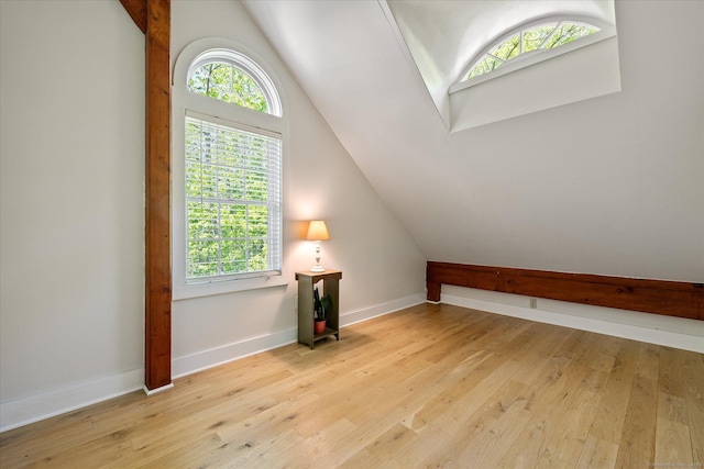 128 Spaulding Rd, Brooklyn, CT 06234 - additional living space with vaulted ceiling, hardwood / wood-style floors, and baseboards