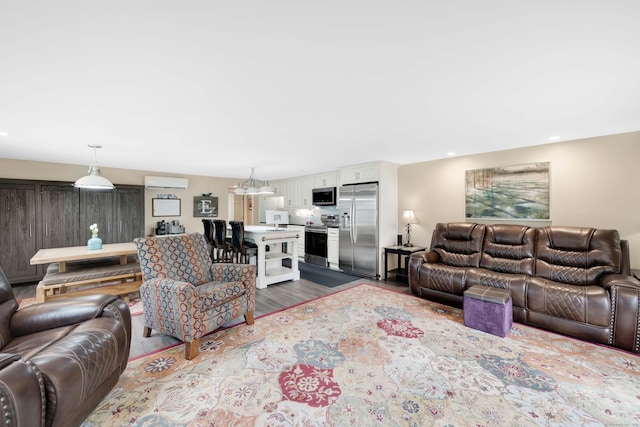 340 Brookfield St, South Windsor, CT 06074 - living room featuring a wall unit AC, dark wood-type flooring, and recessed lighting
