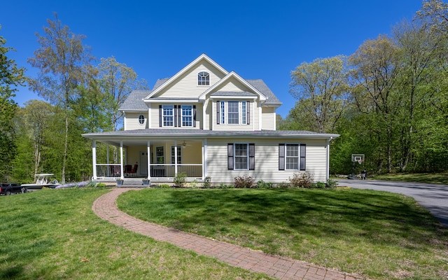31 Cambridge Ct, Colchester, CT 06415 - view of front of property with a porch and a front yard