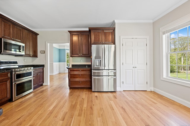 31 Cambridge Ct, Colchester, CT 06415 - kitchen featuring appliances with stainless steel finishes, ornamental molding, light wood-type flooring, and healthy amount of natural light