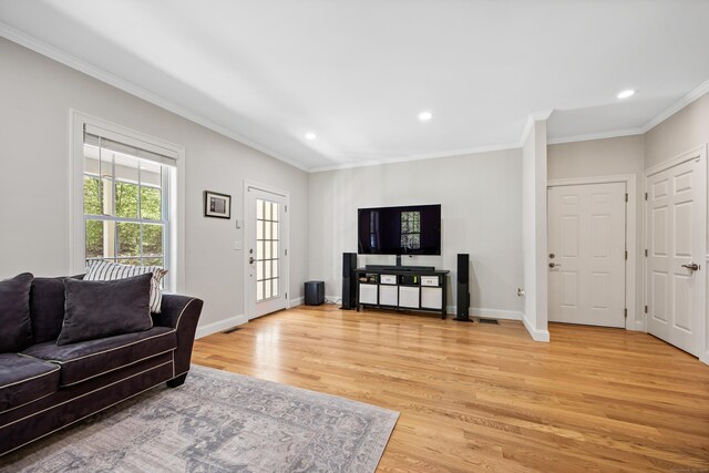 31 Cambridge Ct, Colchester, CT 06415 - living room featuring light wood-style flooring, crown molding, recessed lighting, and baseboards