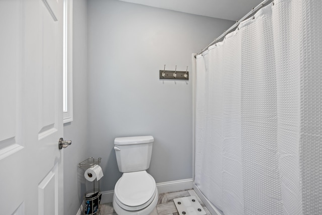 31 Cambridge Ct, Colchester, CT 06415 - bathroom with toilet, baseboards, and a shower with shower curtain