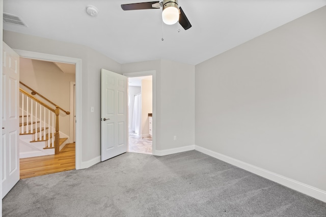 31 Cambridge Ct, Colchester, CT 06415 - unfurnished bedroom with carpet, baseboards, and a ceiling fan