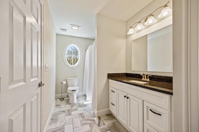 31 Cambridge Ct, Colchester, CT 06415 - full bathroom with toilet, baseboards, and vanity