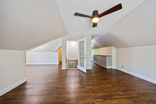 31 Cambridge Ct, Colchester, CT 06415 - bonus room with vaulted ceiling, ceiling fan, baseboards, dark wood-style floors, and french doors