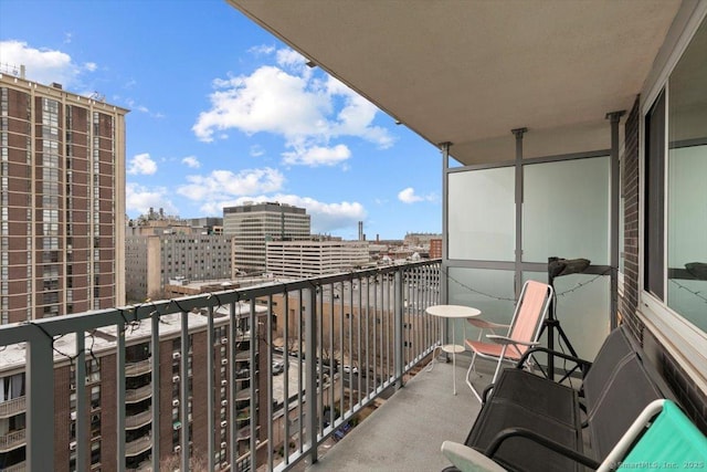 balcony featuring a view of city