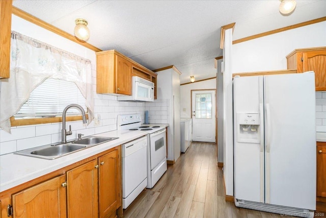 54 Western Sands Sands, Wallingford, CT 06492 - kitchen with a sink, light countertops, white appliances, backsplash, and light wood-style flooring