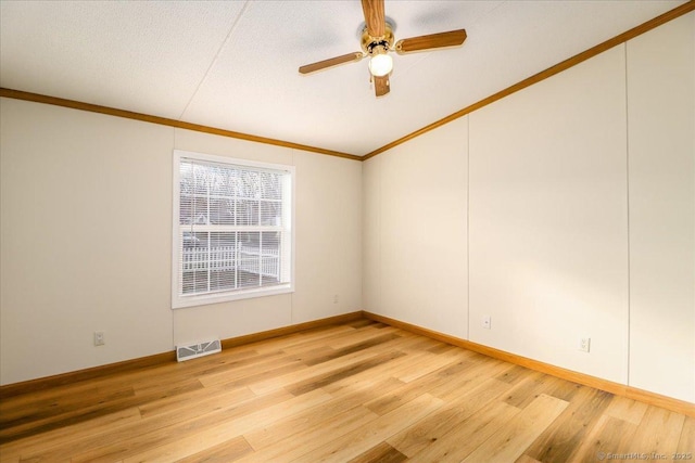 54 Western Sands Sands, Wallingford, CT 06492 - unfurnished room with visible vents, baseboards, ornamental molding, ceiling fan, and light wood-style floors