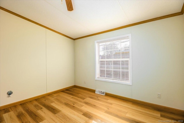 54 Western Sands Sands, Wallingford, CT 06492 - unfurnished room featuring visible vents, baseboards, ceiling fan, crown molding, and light wood finished floors