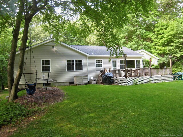 181 Picketts Ridge Rd, Redding, CT 06896 - back of house featuring a lawn, a wooden deck, and a shingled roof