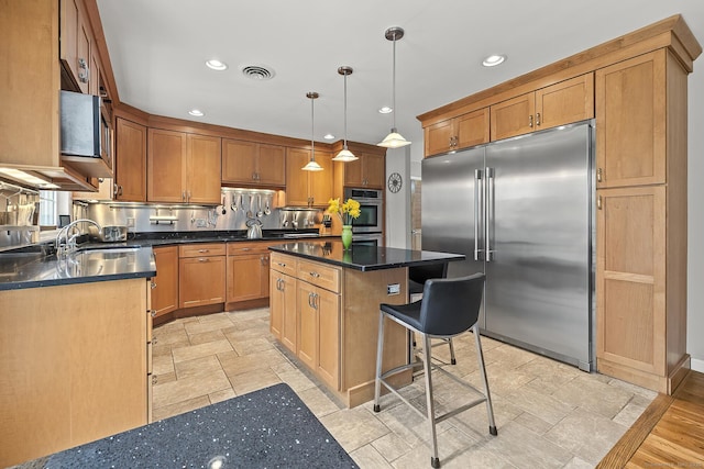 181 Picketts Ridge Rd, Redding, CT 06896 - kitchen featuring stainless steel appliances, a sink, a center island, recessed lighting, and light stone finish flooring