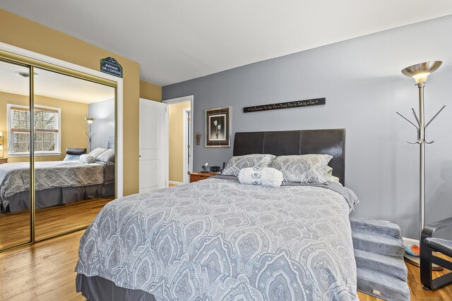 181 Picketts Ridge Rd, Redding, CT 06896 - bedroom featuring wood finished floors, a closet, and baseboards