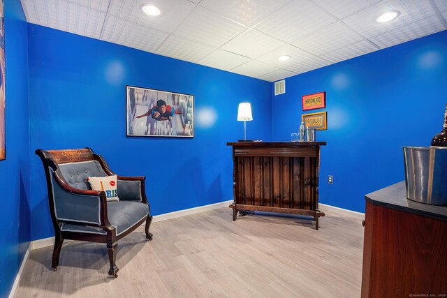 181 Picketts Ridge Rd, Redding, CT 06896 - sitting room with baseboards, wood finished floors, recessed lighting, and a dry bar